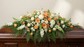 Raquette funéraire – Dominante blanche, touches d’orange
