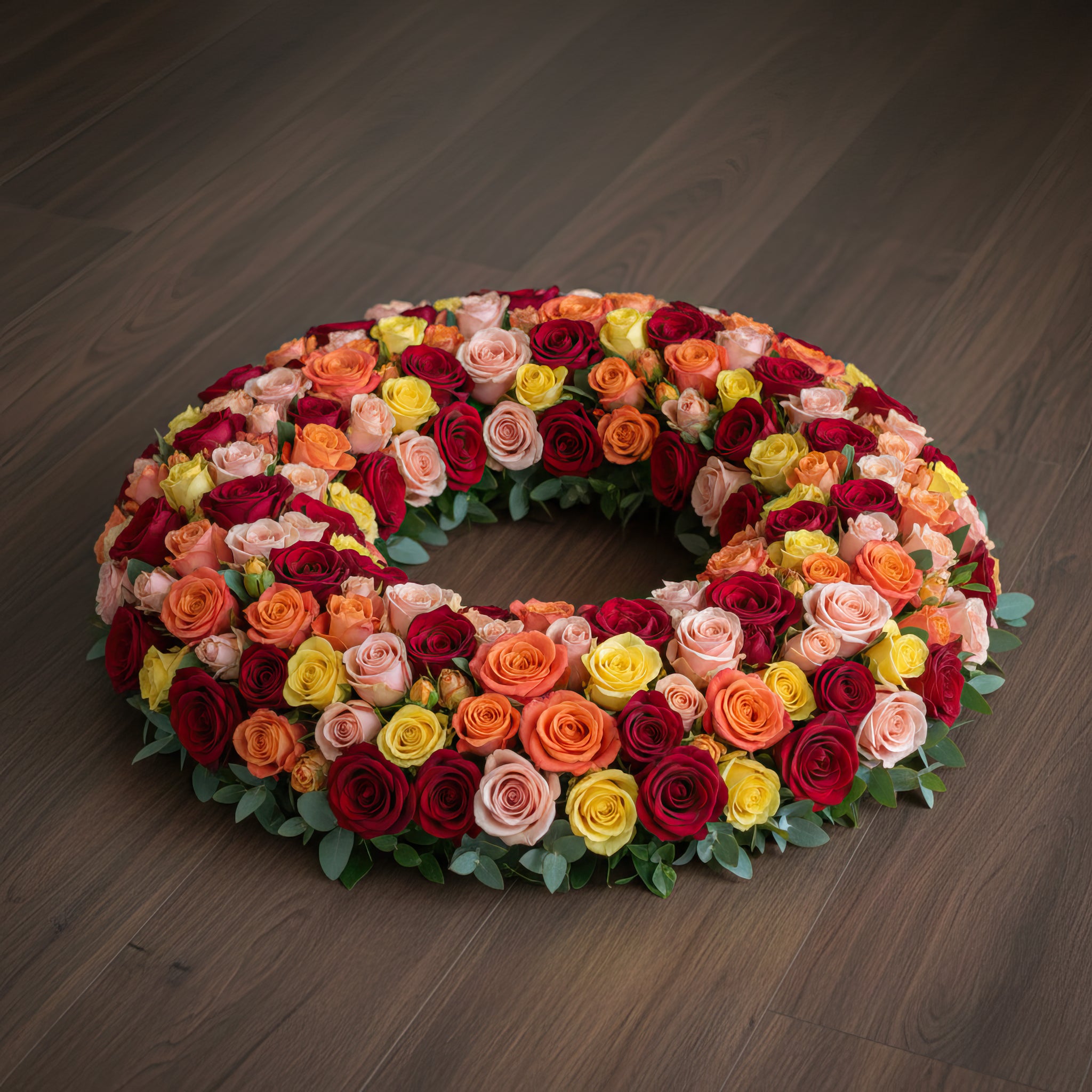 Couronne florale – Exclusivement composée de roses aux teintes chaudes