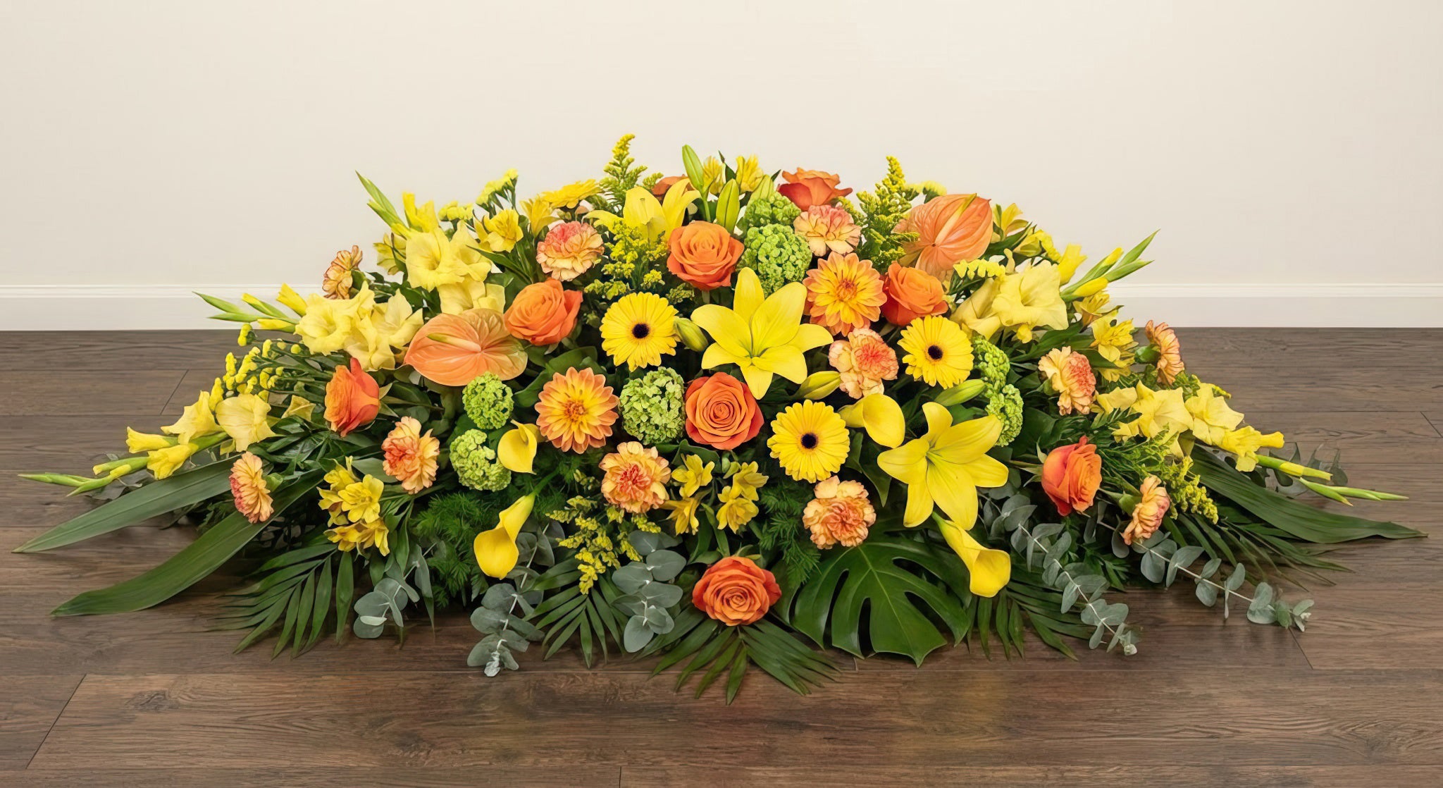 Coussin Premium – Dominante jaune, nuances d'orange et touches de vert