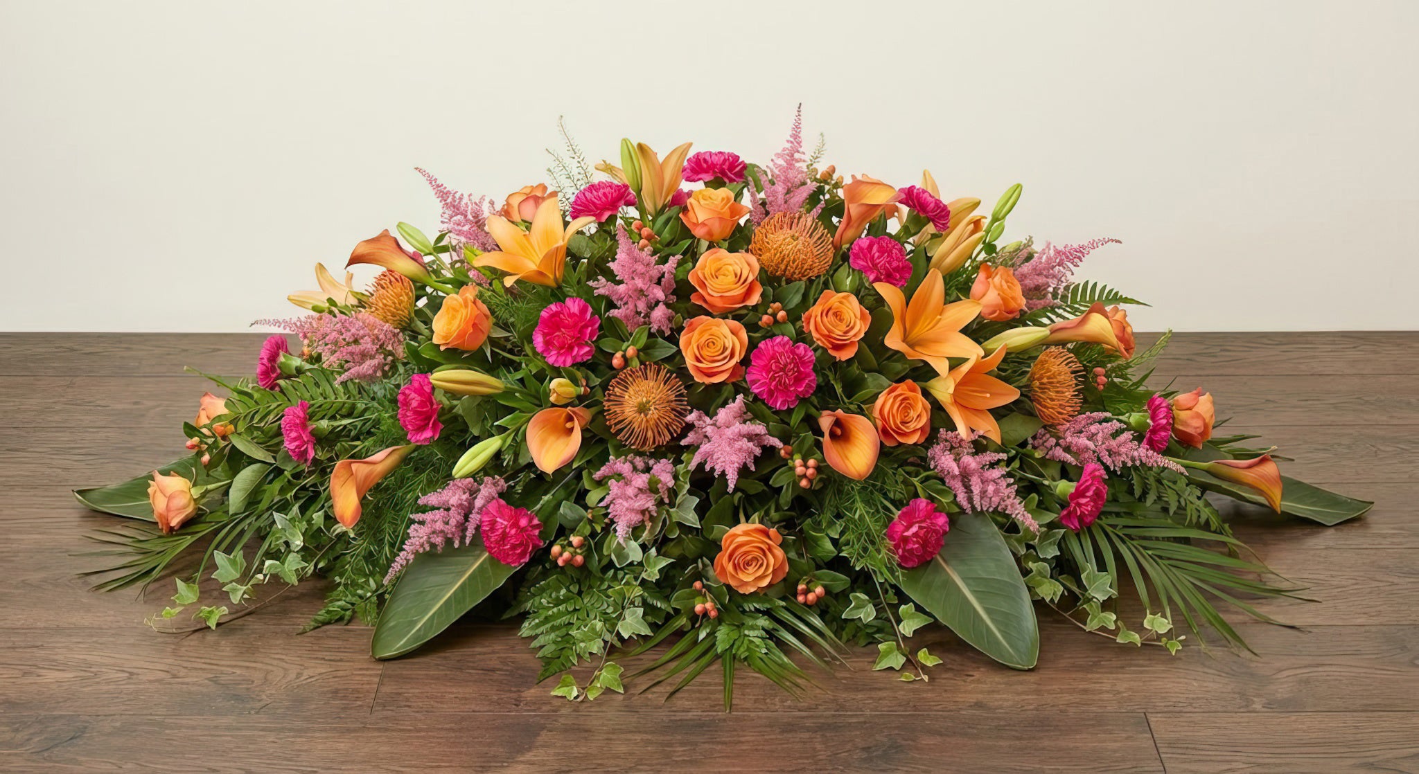 Coussin Premium – Dominante orange, nuances de rose