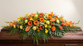 Raquette funéraire – Dominante orange, touches de jaune