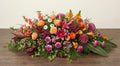 Coussin Premium – Dominante rose, nuances de rose et d'orange