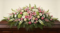 Raquette funéraire – Dominante rose, touches de blanc