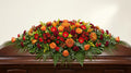 Raquette funéraire – Dominante rouge, touches d'orange