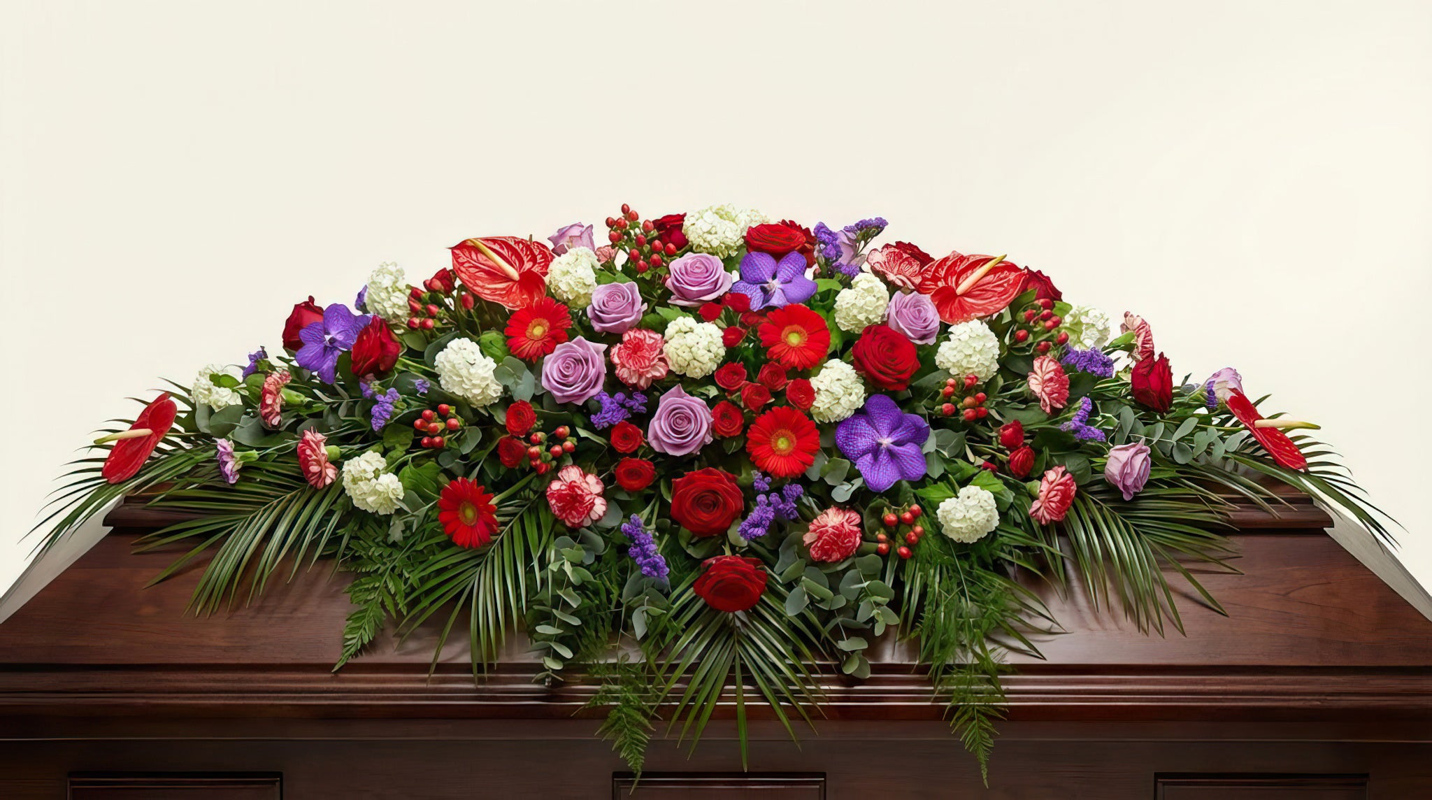 Raquette funéraire – Dominante rouge, touches de violet
